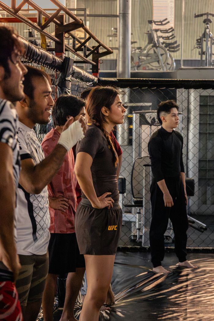 Services Group of diverse adults in a mixed martial arts training session at a gym in San Luis Potosí.